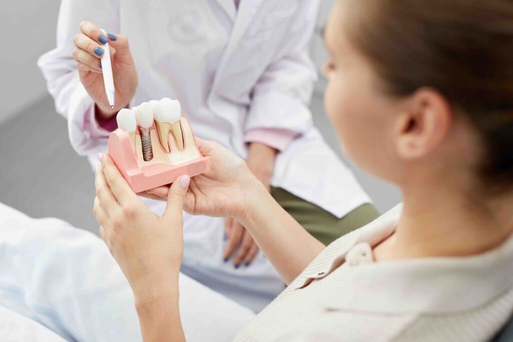 dolore dopo l'impianto dentale
